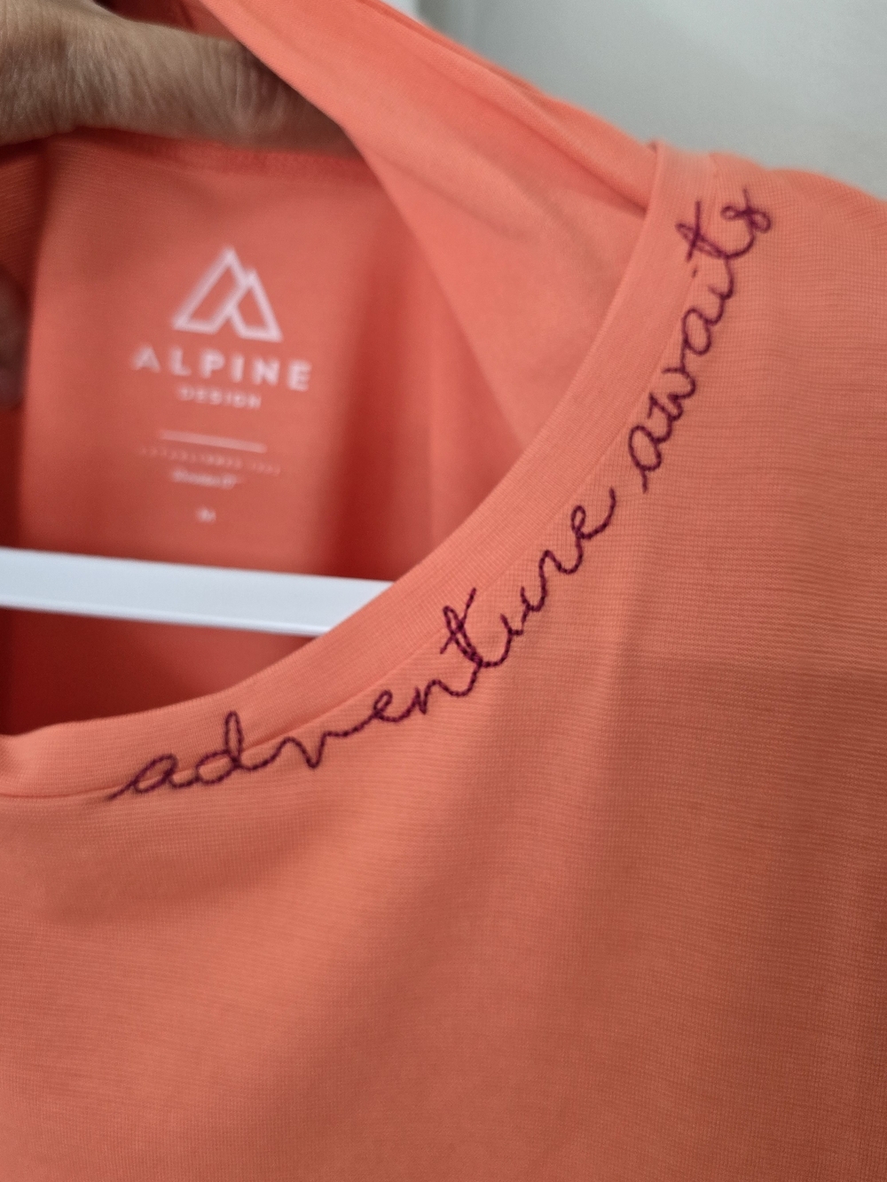 Alpine Design Coral Scoop Neck Tee with "adventure awaits" Embroidery